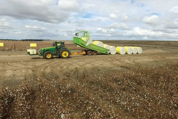 Bale Runner unloading 4 cotton bales